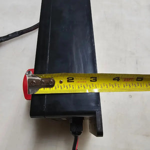 Black marine-grade 48V to 12V step-down converter kit with a red quick disconnect, measuring over 5 inches.