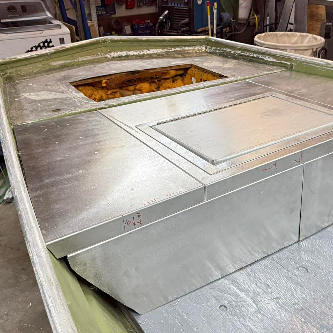 Fast-install aluminum Deck in a Box kit for jon boats, featuring a trim-to-fit design and integrated storage.