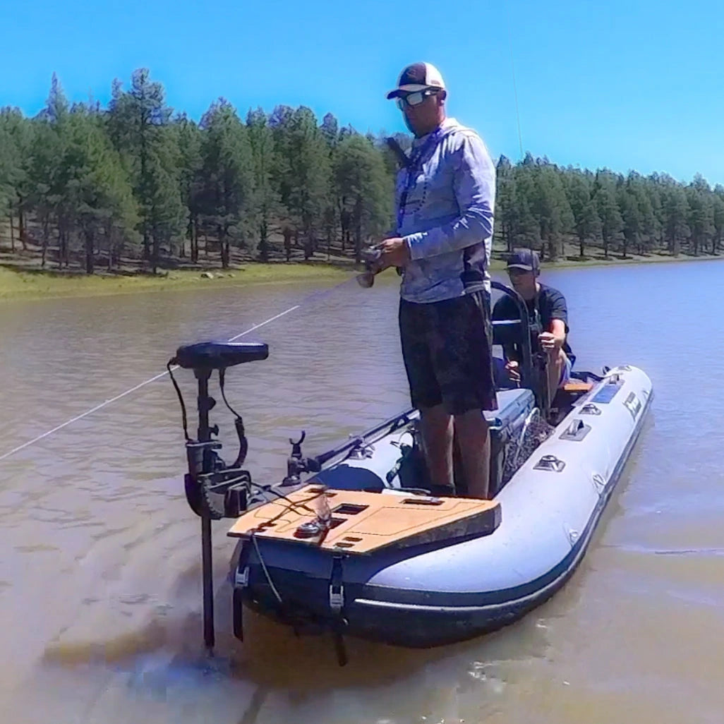 AUTOBOAT Smart Head GPS Pro Anchor System installed on a 12V Minn Kota 30–55lb trolling motor mounted on an inflatable fishing boat in shallow water