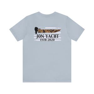 Light blue cotton tee with "Jon Yacht ESTB 2020" and a boat propeller over a camo-patterned American flag.