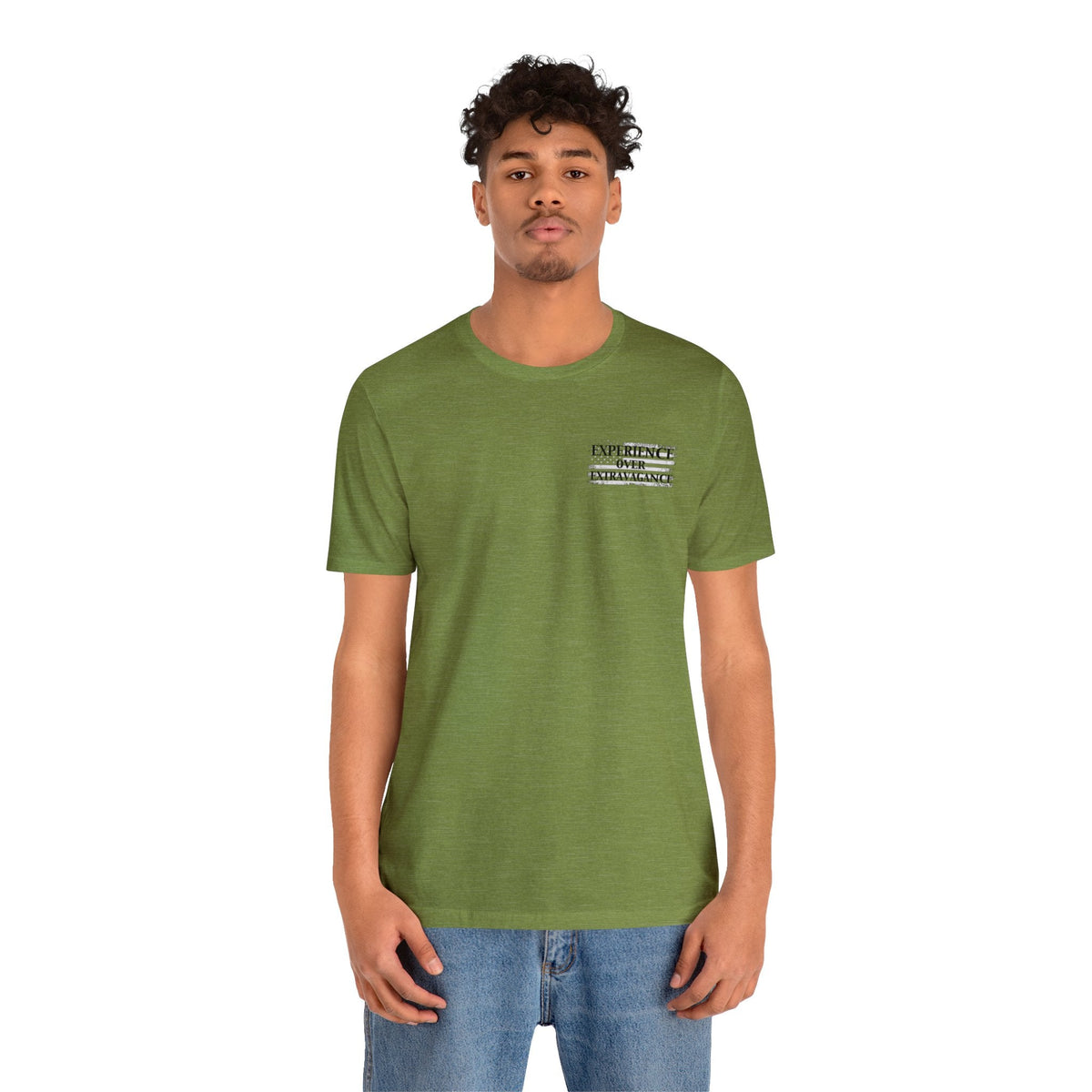 Man in a green "American Dreamer" t-shirt with "Experience Over Extravagance" text.
