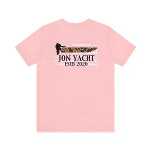 Pink cotton t-shirt with "JON YACHT ESTB 2020" and a boat motor graphic over a camo flag.