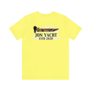 Yellow cotton t-shirt with "JON YACHT ESTB 2020" and a boat motor graphic over a camo American flag.