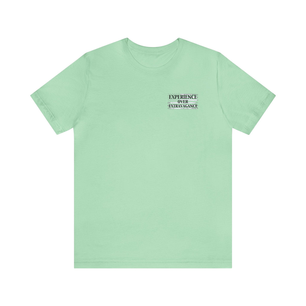 Light green unisex cotton tee with "EXPERIENCE OVER EXTRAVAGANCE" text on the left chest.