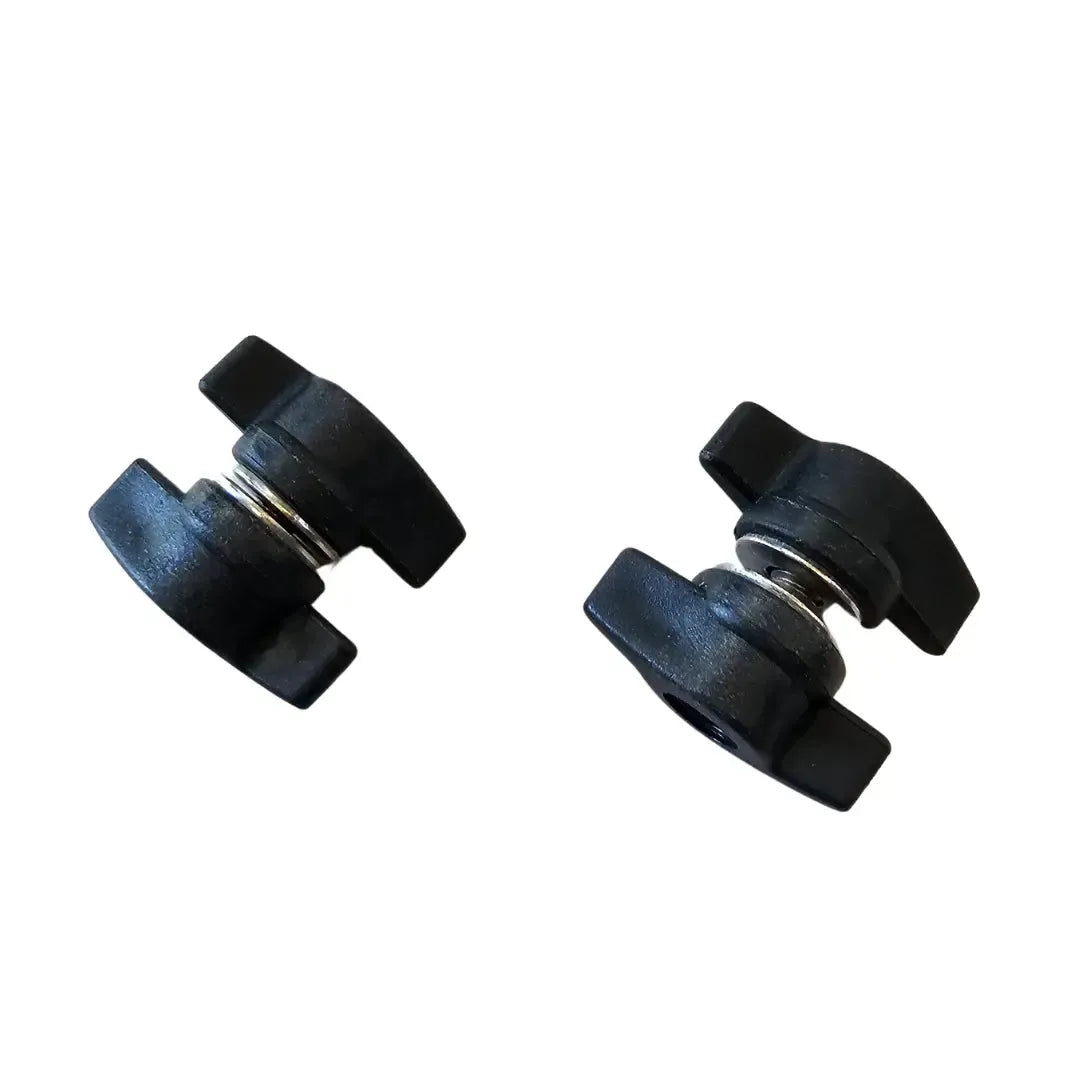 Two black plastic wing nuts with silver springs, Autoboat quick release battery connectors.