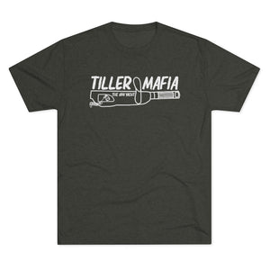 Dark gray tri-blend regular fit tee with white "TILLER MAFIA THE ION YACHT" graphic.