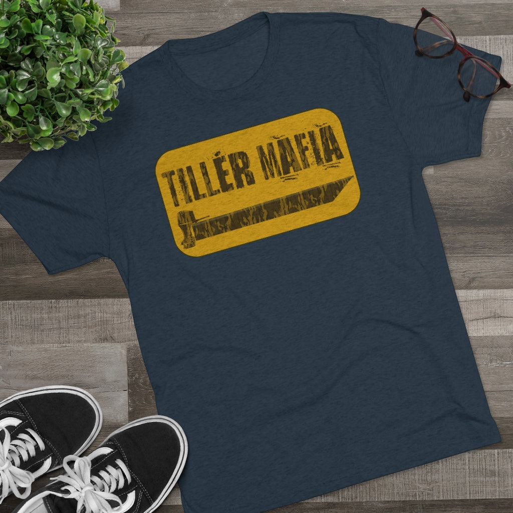 Navy blue CAMO Tiller Mafia Tee with a distressed yellow graphic featuring a tiller blade.