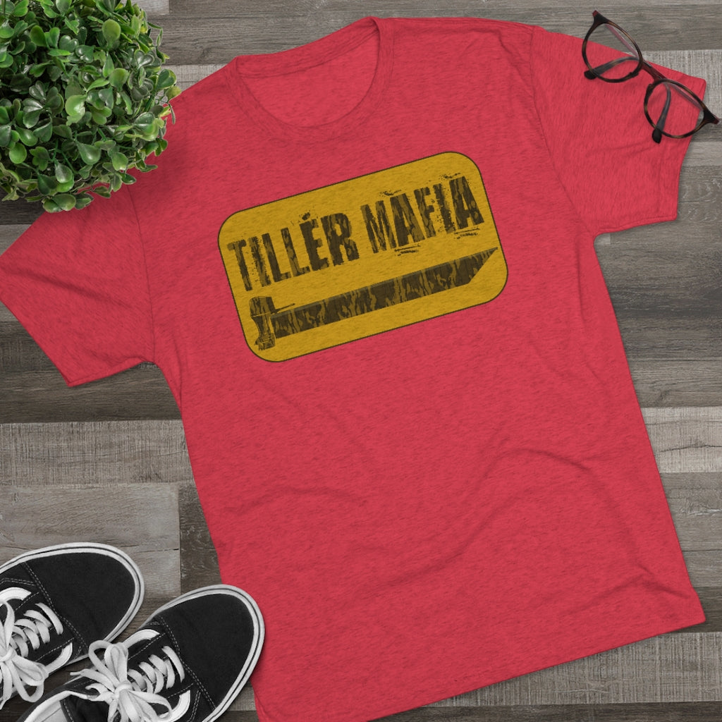 Red CAMO Tiller Mafia Tee with a distressed yellow and black graphic of a tiller on soft cotton fabric.