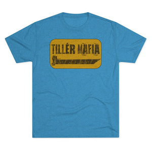Blue CAMO Tiller Mafia Tee with a distressed yellow rectangular graphic featuring a tiller handle and boat.