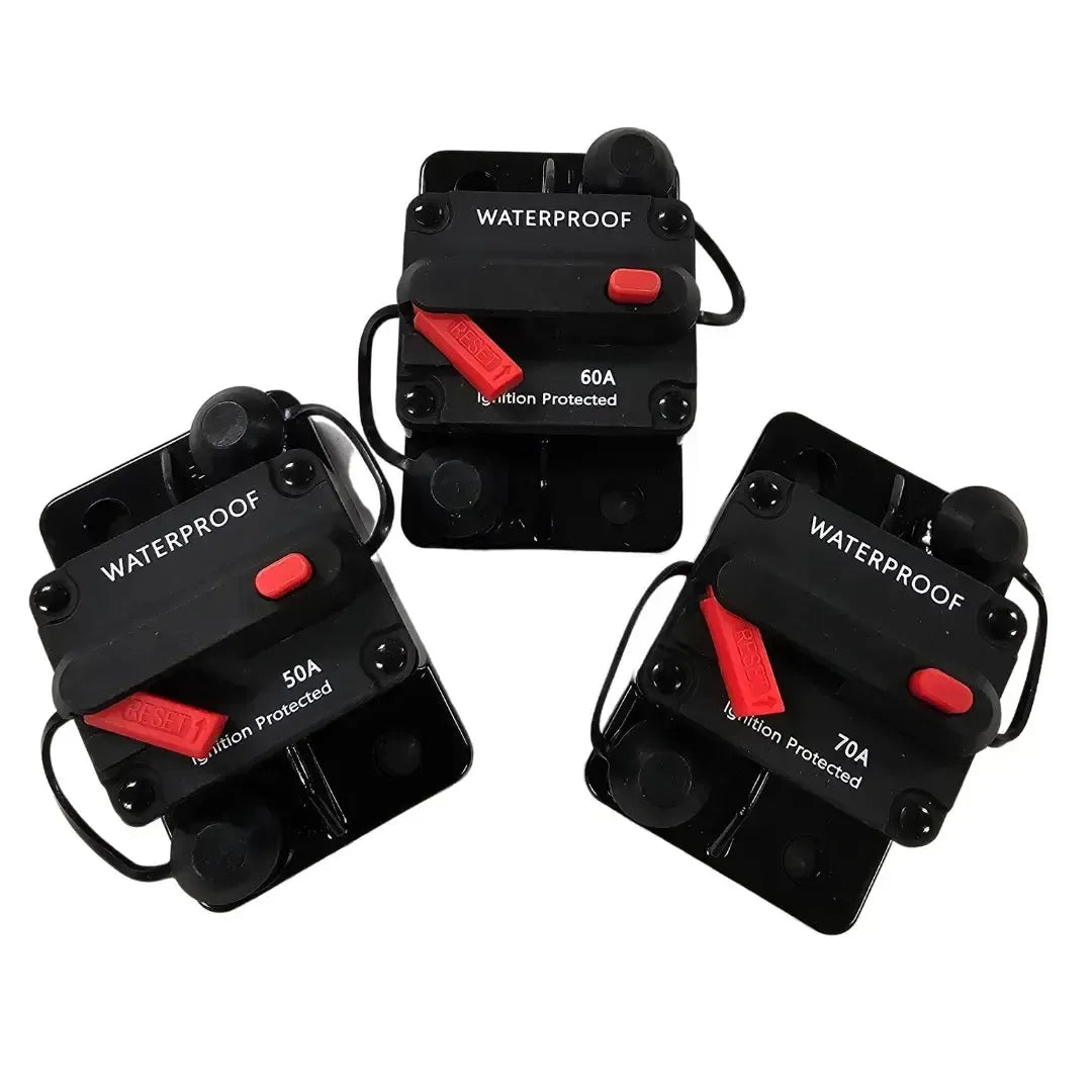 Black waterproof 60A circuit breaker for trolling motors with red reset button and rubber cap.