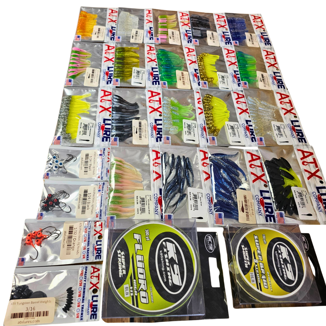 Assortment of colorful ATX Lures soft plastic baits, jig heads, K9 Crappie Line spools, and tungsten weights.