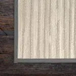 DuraVinyl Marine Flooring, Monterey Series, light beige woven vinyl with subtle stripes and a dark gray border.