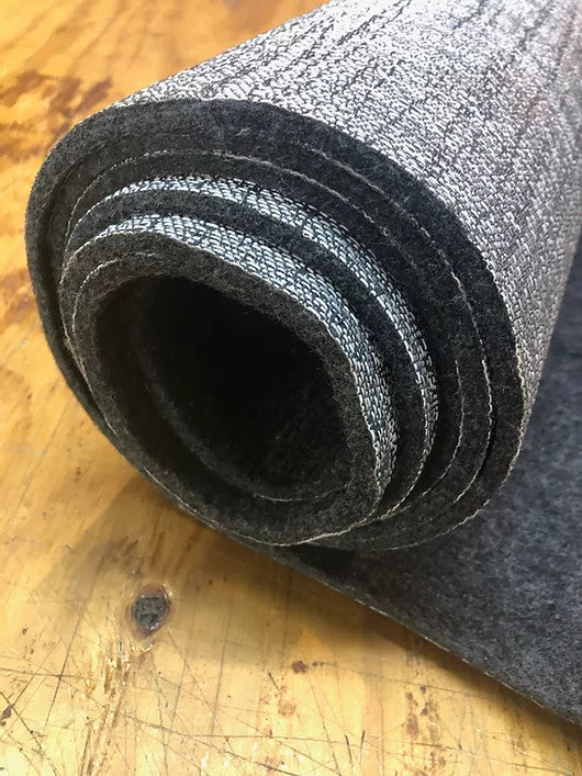 Rolled DuraVinyl Marine Flooring Somerset Series, showing dark gray felt backing and textured vinyl surface.
