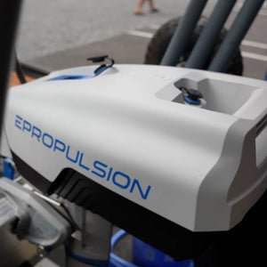 Front view of a small electric vehicle featuring the word "EPropulsion" prominently displayed on its body. 