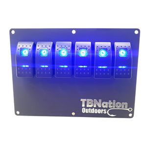 Black 6-position switch panel with illuminated blue rocker switches and "TBNation Outdoors" logo