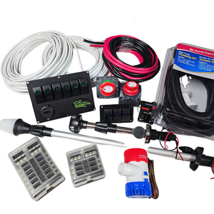 Assortment of electrical and plumbing boat components including white and red/black wires, fuse boxes, switches, and a bilge pump.