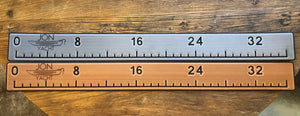 Two 38 1/4" x 4" ruler pads, one silver and one bronze, with "JON YACHT" logo and measurements.