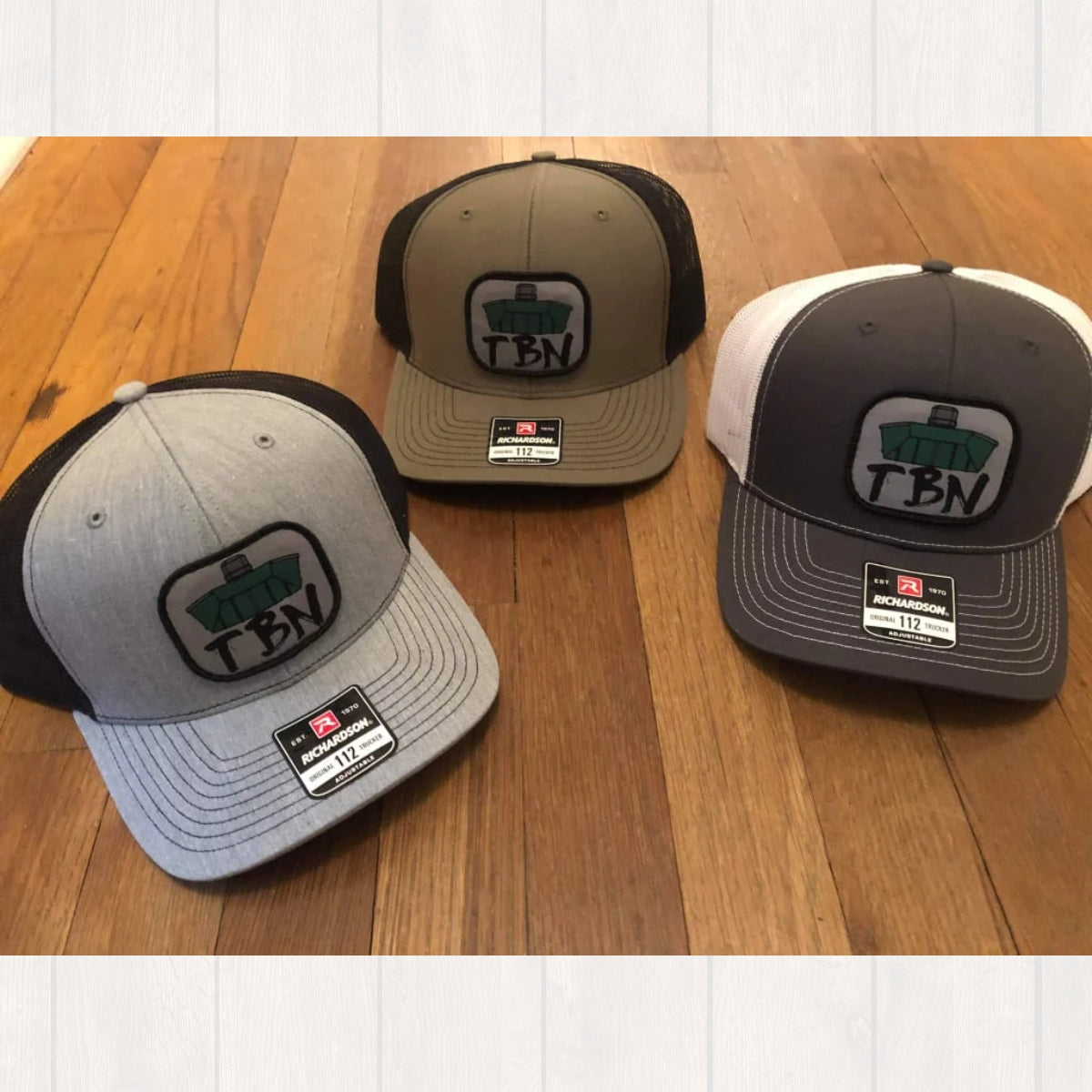 Richardson 112 hats in gray, black, and green, featuring an embroidered TBN Jon Boat patch.