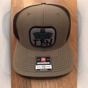 Olive green Richardson 112 trucker hat with black mesh back and embroidered TBN Jon Boat patch.