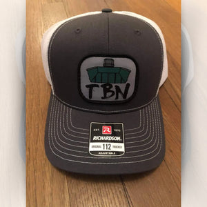 Richardson 112 trucker hat with a gray front, white mesh back, and TBN Jon Boat embroidered patch.