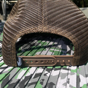 Brown mesh trucker hat with a snapback closure and "TBNation" tag.
