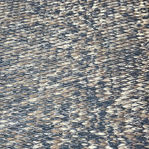 Hydro Turf 45x84" EVA foam traction mat with molded diamond cut in dark blue and tan.