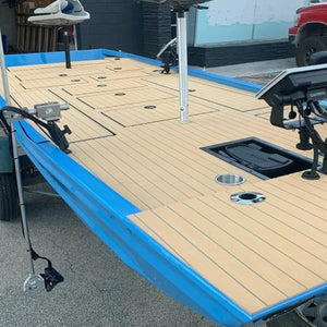 Blue boat deck with 2-tone wide groove teak cut Hydro-turf, showing a light brown textured surface.