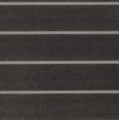 Dark gray HydroTurf EVA foam decking sheet with light gray routed lines, showing the two-tone material.