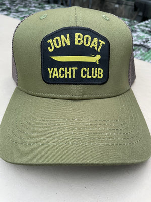 Olive green Jon Boat Yacht Club hat with a black and yellow embroidered patch, featuring a mesh back.
