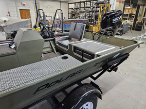 Olive green boat interior with a flip-up stowable seat and textured gray EVA foam flooring.