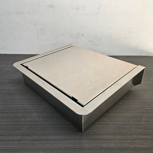 Silver stainless steel JumpSeat, a flip-up stowable boat seat with a flat lid, designed for DIY drop-in installation.