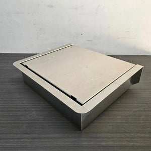 Silver stainless steel JumpSeat, a flip-up stowable boat seat with a flat lid, designed for DIY drop-in installation.