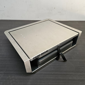 Silver Few-Man JumpSeat, a flip-up stowable boat seat with a black vinyl cushion and cinch strap.