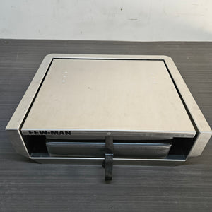 Silver aluminum Few-Man JumpSeat with a charcoal vinyl cushion and black cinch strap, designed for boat decks.
