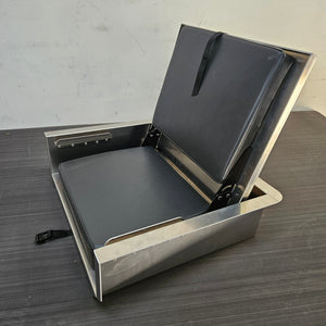 Silver aluminum flip-up stowable boat seat with black vinyl cushions, open and ready for use.