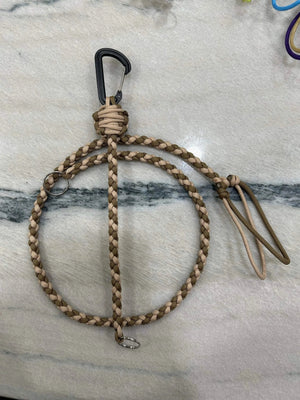 Braided tan and brown paracord key lanyard with a black carabiner and metal kill switch clip.