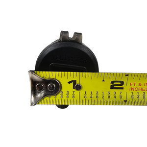 Black round LED voltmeter with "VOLTMETER" text, measured by a yellow tape measure showing 1.5 inches.