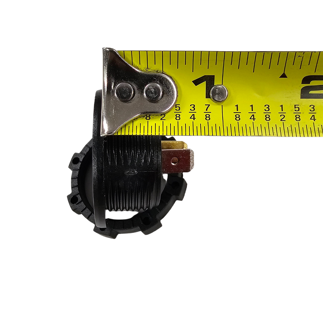 Black, round LED voltmeter with two terminals, measured by a yellow tape measure.