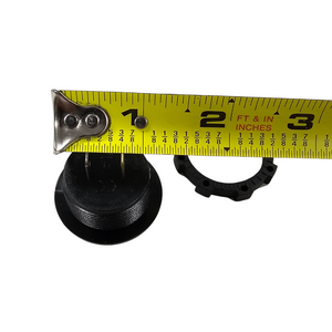 Black LED voltmeter with a threaded body and mounting nut, measured by a yellow tape measure.
