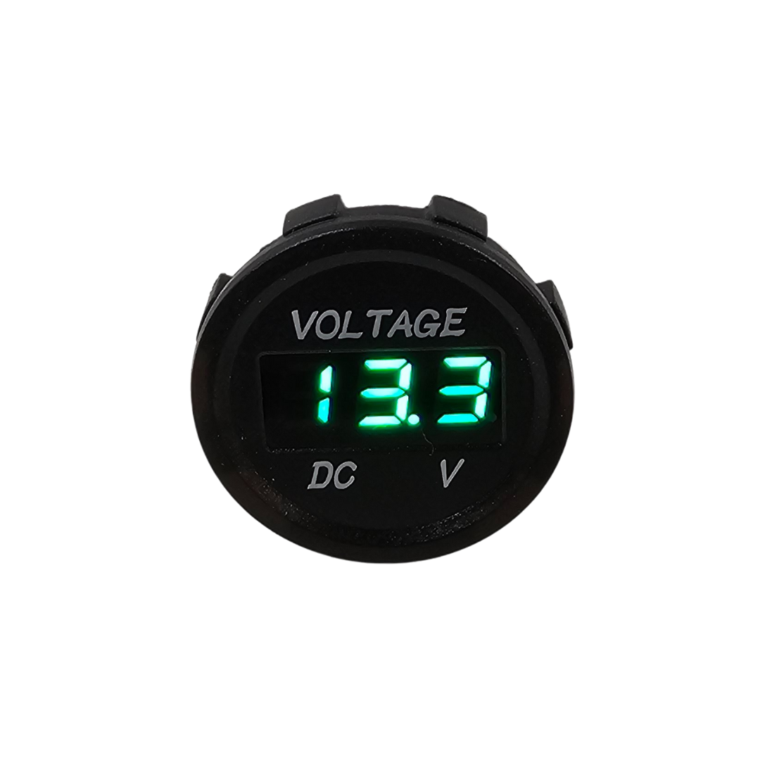 Round black LED voltmeter with a bright green digital display showing "13.3 V" and "VOLTAGE DC".