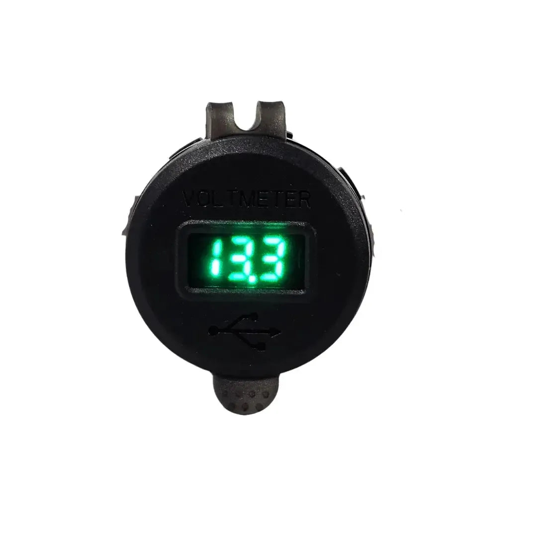 Black round LED voltmeter with green digital display and USB charging port.