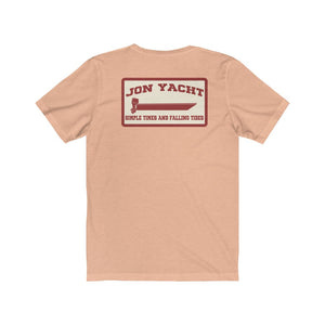 Peach short sleeve jersey tee with "Jon Yacht" boat graphic and "Simple Times and Falling Tides" text.