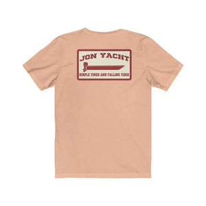 Peach short sleeve jersey tee with "Jon Yacht" boat graphic and "Simple Times and Falling Tides" text.