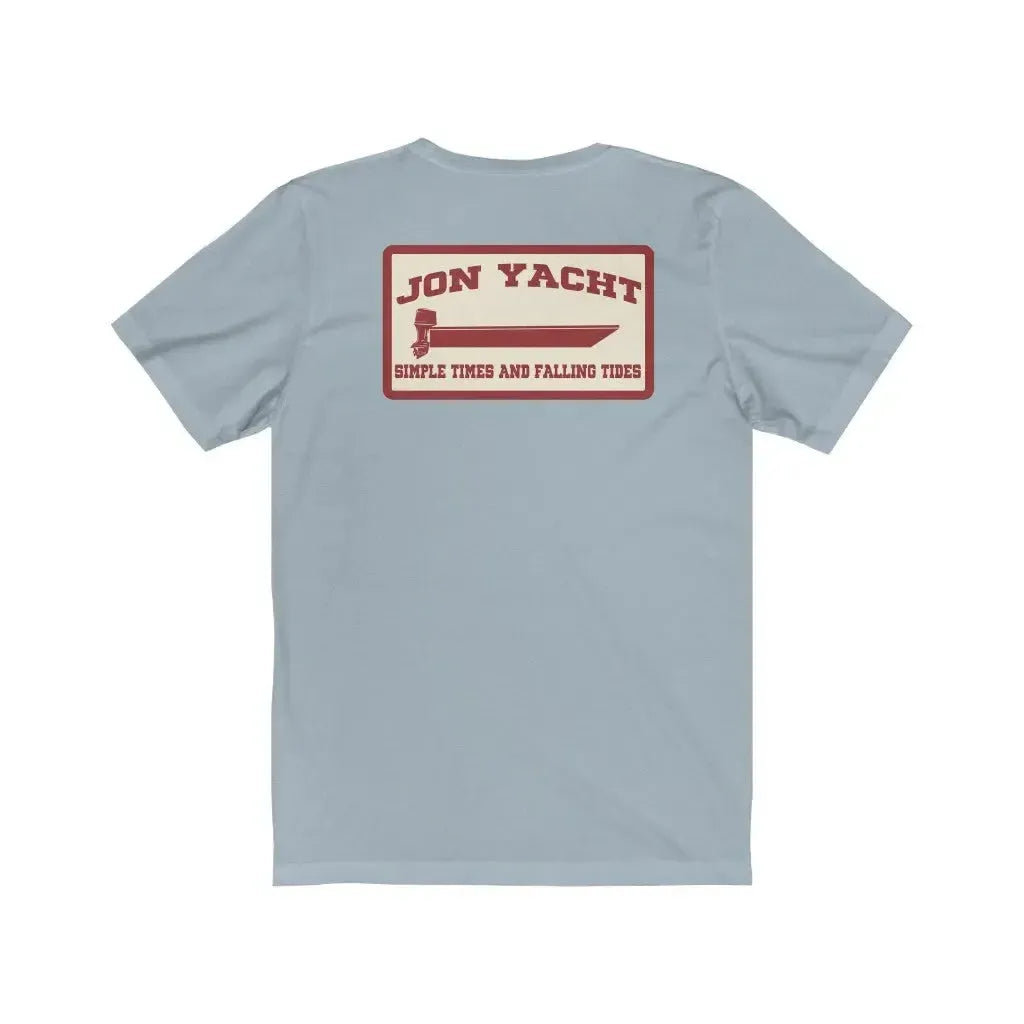 Light blue soft cotton jersey tee with "Jon Yacht" boat graphic and "Simple Times and Falling Tides" text on back.