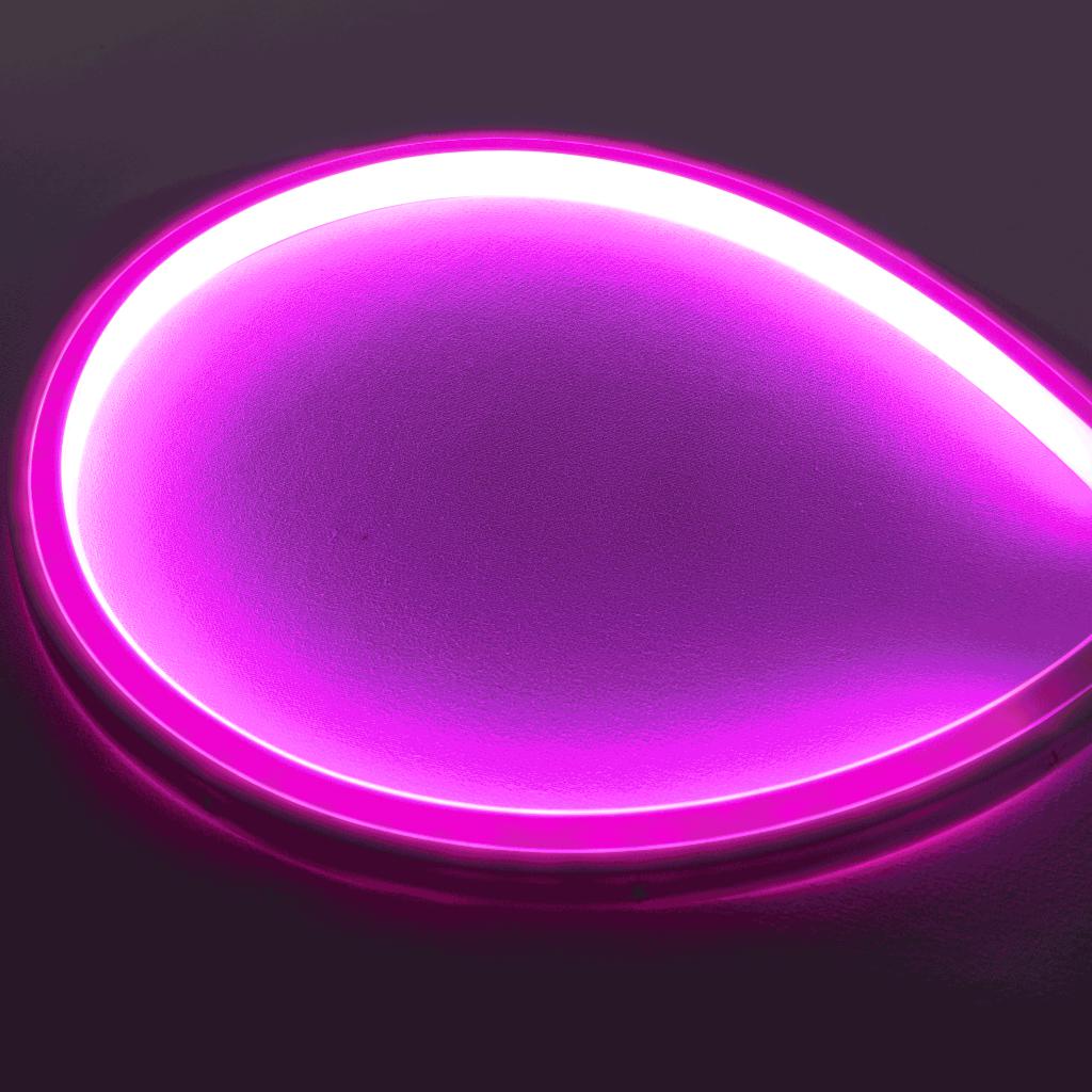 Close-up of a glowing purple MEGA LED Neon Flex strip, showing its smooth, uniform light.