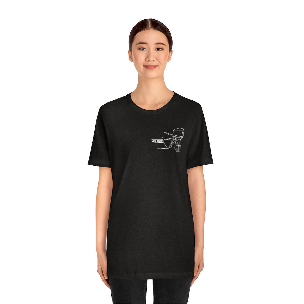 Woman wearing a black MERC Tiller t-shirt with a white outline graphic of a boat motor.