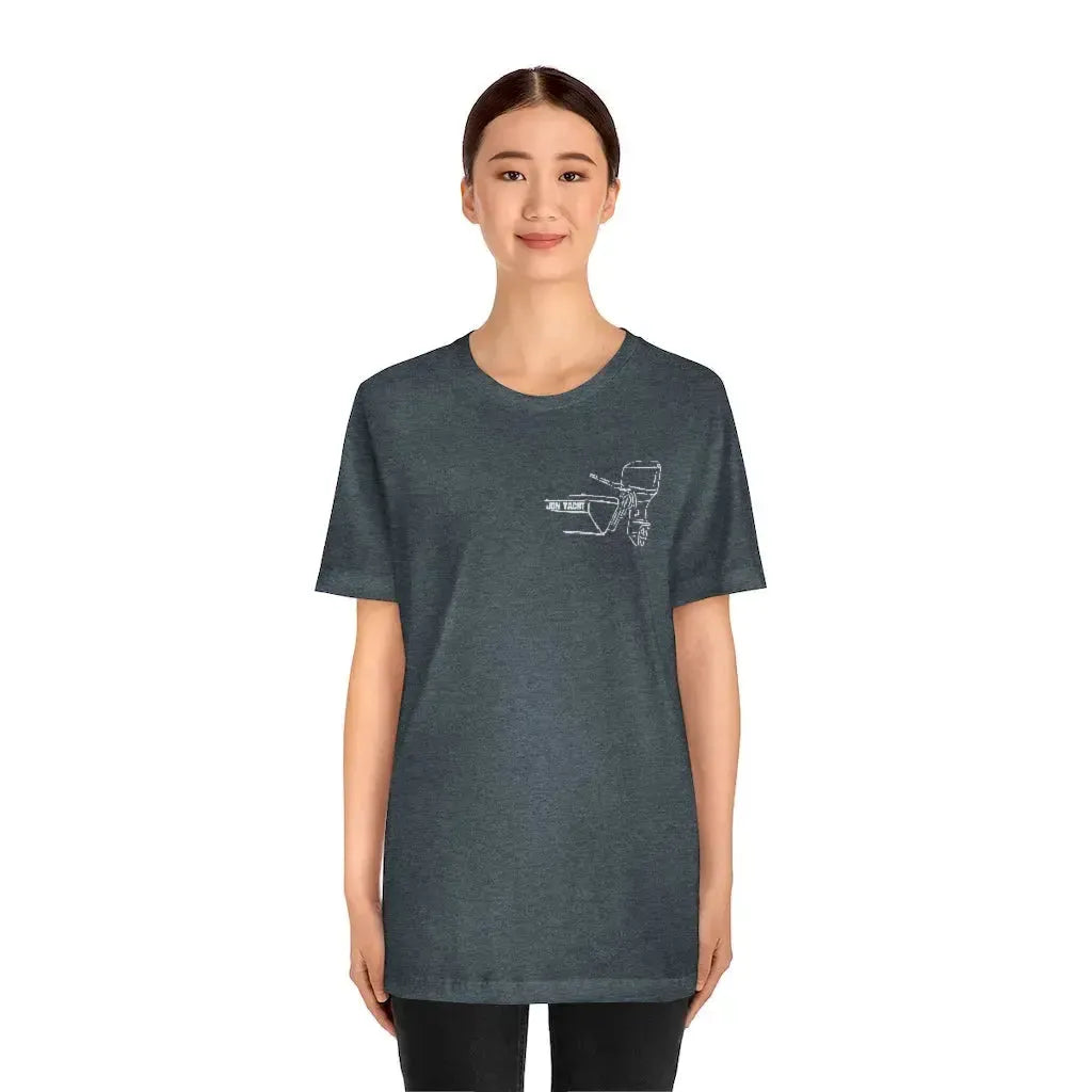 Woman wearing a charcoal gray cotton tee with a white MERC Tiller outboard motor graphic.
