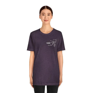 Woman wearing a purple MERC Tiller graphic tee made from soft Airlume combed cotton.