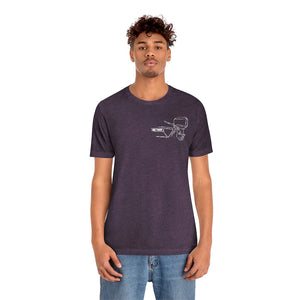 Man wearing a heather purple MERC Tiller graphic tee with a white outline design on the left chest.
