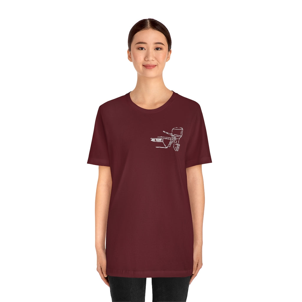 Woman wearing a maroon MERC Tiller graphic tee made from soft Airlume combed and ringspun cotton.
